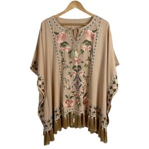 Fringe Tassels and Embroidered Shirt